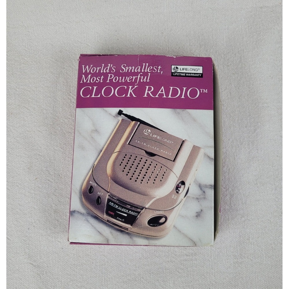 World's Smallest Most Powerful Clock Radio Handheld AM/FM LifeLong